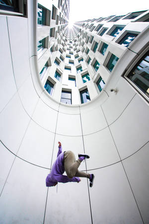 Parkour Under Tall Building Wallpaper