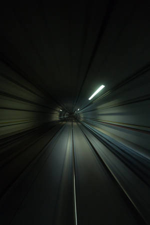 Passing A Tunnel At High-speed Iphone Wallpaper