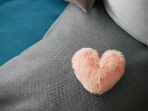 Pastel Pink Heart On Pillow Wallpaper
