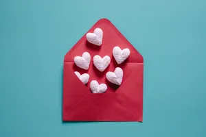 Pastel Pink Heart Shapes In Envelope Wallpaper