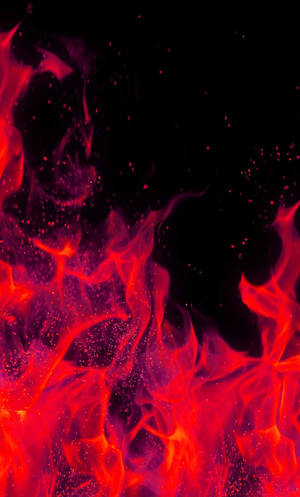 Pastel Red Fire In The Dark Wallpaper