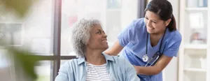 Patient And Nurse Smiling Wallpaper