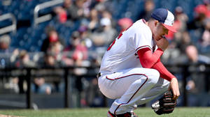 Patrick Corbin Crouching Down Wallpaper