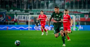 Patryk Klimalain Action During Match Wallpaper