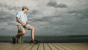 Paul Azinger Holding Fishing Rod Wallpaper