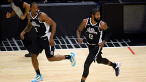 Paul George Of The Los Angeles Clippers Celebrates A Big Three Pointer. Wallpaper