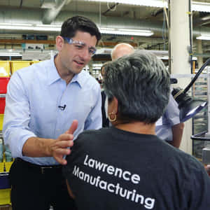 Paul Ryan In Lawrence Manufacturing Warehouse Wallpaper