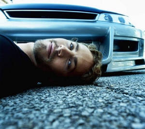 Paul Walker Showing Off His High-performance Car Wallpaper