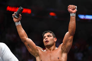 Paulo Costa Raising Hands In Victory Wallpaper