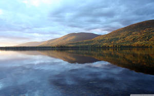 Peaceful Hills And Complex River Wallpaper