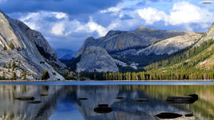 Peaceful Sunset Over The Rocky Mountains Wallpaper