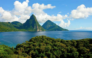 Peaks Reaching Clouds In St Lucia Wallpaper