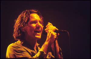 Pearl Jam Rocking The Stage With Eddie Vedder Wallpaper