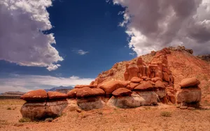 Pedestal Rocks In A Desert Landscape Wallpaper