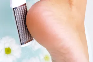 Pedicure Essentials: Foot File Scrubbing Sole Wallpaper