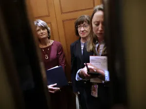 Peeking Through Door Lisa Murkowski Wallpaper