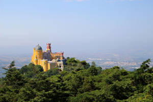 Pena Palace In Sintra From Afar Wallpaper