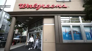 People Exiting Walgreens Store Wallpaper