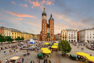 People Flocking At The Main Market Square, Krakow Poland Wallpaper