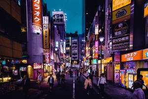 People Walking Night City Wallpaper