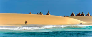 People Walking On Cape Verde Beach Wallpaper