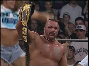 Perry Saturn Lifting His Championship Belt Wallpaper