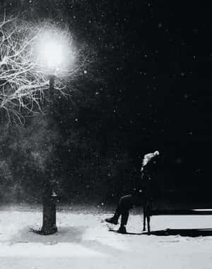 Person Waiting Beside The Street Light Wallpaper