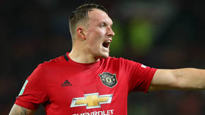 Phil Jones Screaming Arm Out Wallpaper