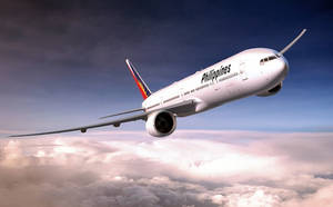 Philippine Airlines Gliding Above Clouds Wallpaper