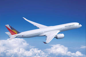 Philippine Airlines Plane Flying Above Clouds Wallpaper