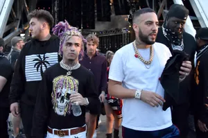 Photo Lil Pump Poses In His Iconic Neon Pink Hairstyle Wallpaper