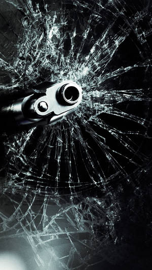 Photo Shows Broken Glass With Gun Wallpaper