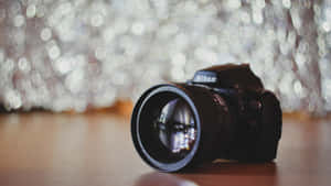 Photography Camera On Wooden Table Wallpaper