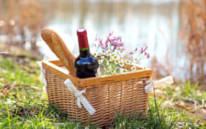 Picnic Basket With Wine & Flowers Wallpaper