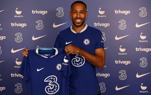 Pierre-emerick Aubameyang Holding Chelsea Jersey Wallpaper