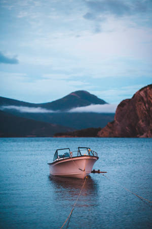 Pink Boat On Calm Water Wallpaper