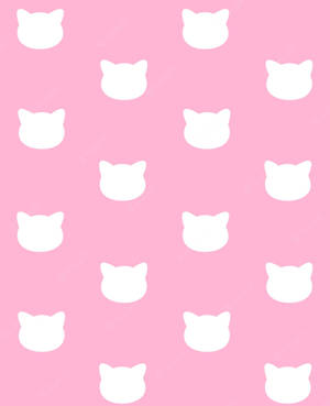 Pink Cat Sitting Near A Table Wallpaper