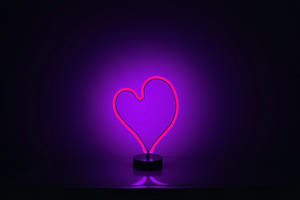 Pink Neon Heart And Purple Glowing Light Wallpaper