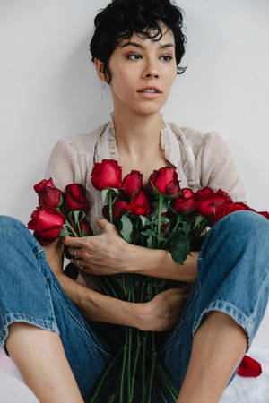 Pixie Woman Holding Red Roses Wallpaper