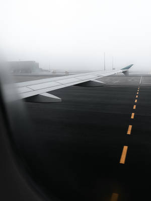 Plane Wing On The Runway Wallpaper
