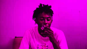 Playboi Carti Shines In A Bright And Bold Hd Wallpaper Wallpaper