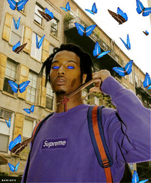 Playboi Carti Surrounded By Butterflies Wallpaper