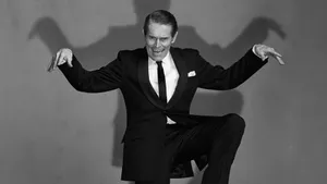 Playful Moment With Willem Dafoe Wallpaper