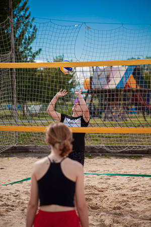 Playing Volleyball On The Beach Wallpaper