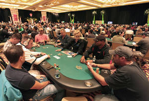 Poker Table With Players Wallpaper