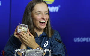 Polish Tennis Prodigy Iga Swiatek Takes Questions At A Press Conference Wallpaper