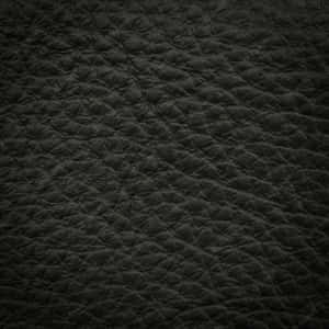 Polished Black Leather Exudes Luxury And Sophistication. Wallpaper