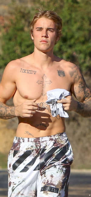 Pop Sensation Justin Bieber Takes The World By Storm In 2021. Wallpaper