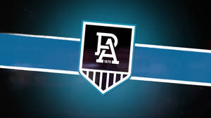 Port Adelaide Afl Team In Action Wallpaper