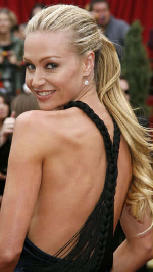 Portia De Rossi Elegant Black Dress Red Carpet Wallpaper